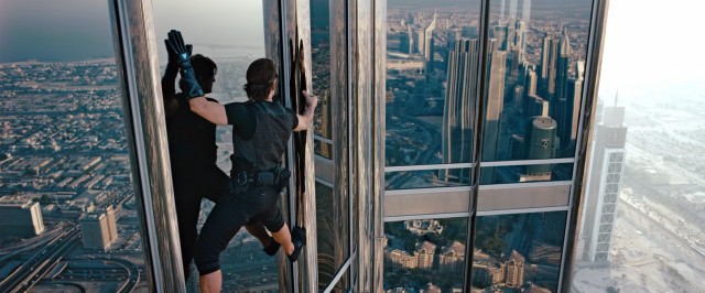 Doing his own death-defying stunt, Tom Cruise climbs along the side of Dubai's Burj Khalifa, the world's tallest building.