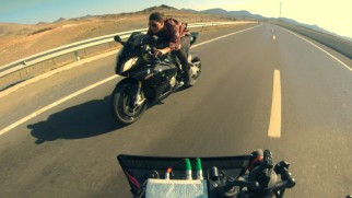 Fearless Tom Cruise goes for a motorcycle ride through Morocco sans helmet in "Sand Theft Auto."