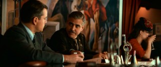 "You're either in or you're out. Right now." Stokes (George Clooney) recruits James Granger (Matt Damon) for the Monuments Men.