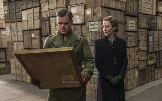 James Granger (Matt Damon) and Claire Simone (Cate Blanchett) admire a recovered painting.