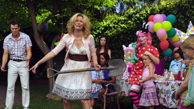 A woman (Elizabeth Banks) interrupts a child's birthday party to confront her boyfriend's (Josh Duhamel) animated cat Beezel in the end credits segment of "Movie 43."
