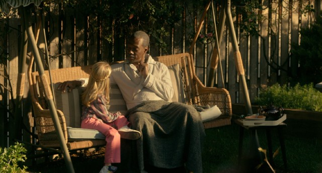 His hair grayed with age, Mr. Church (Eddie Murphy) also serves as a magical presence to Izzy Marie Brooks (McKenna Grace), a third generation of the family he served.