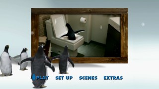 Popper's penguins watch one of them getting acquainted with a toilet on the DVD main menu.