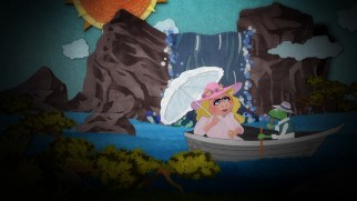 Miss Piggy enjoys a boat ride with Kermit in one of the scenes recreated on the Blu-ray's inspired animated main menu.