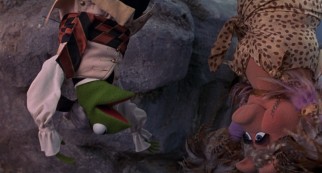 If it's performed upside down, a Kermit the Frog/Miss Piggy love song couldn't possibly slow the movie down, right?