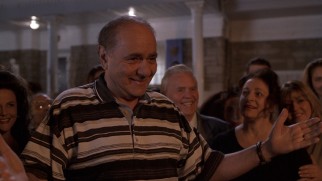 Though he has misgivings at first, Gus Portokalos (Michael Constantine) comes to welcome his son-in-law with open arms.