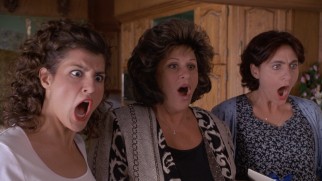Something shocks the Portokalos women (Nia Vardalos, Lainie Kazan, and Bess Meisler).