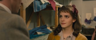 In her first live-action theatrical film role after Hermione Granger, Emma Watson plays the relatively insignificant part of wardrobe girl Lucy.