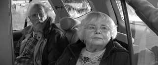 Kate Grant (June Squibb) makes small talk with the friendly old couple whose air compressor her sons are currently in the process of un-stealing.