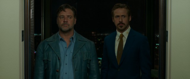 Jackson Healy (Russell Crowe) and Holland March (Ryan Gosling) reconsider getting off the elevator based on what they see in one of the funniest scenes of "The Nice Guys."