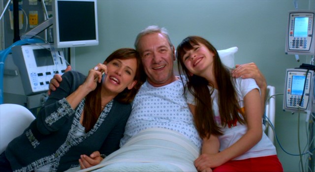 Spoiler alert: Tom (Kevin Spacey) comes out of the coma, his consciousness restored, now appreciative of his wife (Jennifer Garner) and daughter (Malina Weissman). The End. Roll credits!