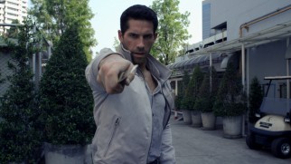 Casey Bowman (Scott Adkins) more than holds his own in a Japanese alley fight.