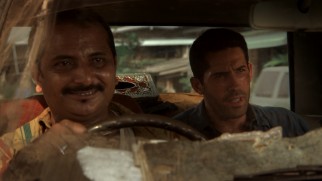 The closest thing to a friend that Casey makes in Myanmar is the chatty, friendly cab driver Mike (Mukesh Bhatt.