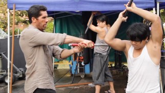 Scott Adkins and a castmate rehearse a sword fight on the set of "Ninja: Shadow of a Tear."