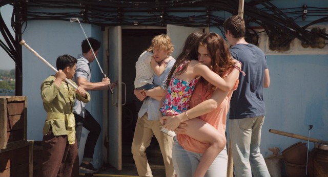 The Dwyers find short-lived shelter on the roof of the Imperial Lotus Hotel.