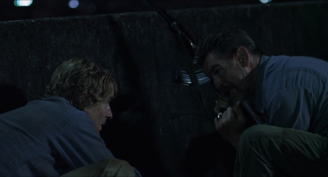 Jack Dwyer (Owen Wilson) and family get an ally in the form of Hammond (Pierce Brosnan), a rock star-like covert British agent functioning as Deus Ex Machina.