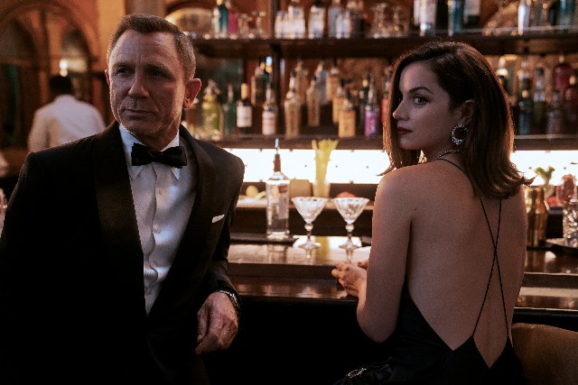 The unretired James Bond (Daniel Craig) gets teamed with a confident new recruit (a scene-stealing Ana de Armas)  in "No Time to Die."