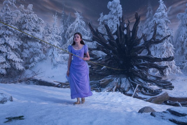 In Disney's "The Nutcracker and the Four Realms", Clara Stahlbaum (Mackenzie Foy) follows a gold rope to the fantastical Christmas Tree Forest.