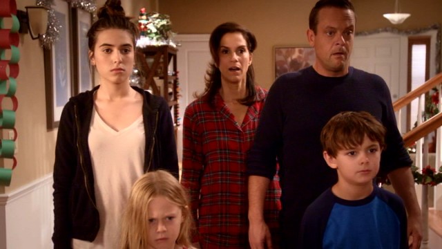 The Weavers (Clara Mamet, Isabella Cramp, Jami Gertz, Lenny Venito, and Max Charles) get a big Christmas morning surprise from their neighbors in "Merry Crap-Mas."