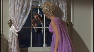 Jack waves to Leo's wife.
