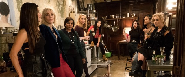 In "Ocean's Eight", Debbie Ocean (Sandra Bullock) and Lou (Cate Blanchett) lead a team of eight women in an attempt to steal a $150 million diamond necklace from the Met Gala.