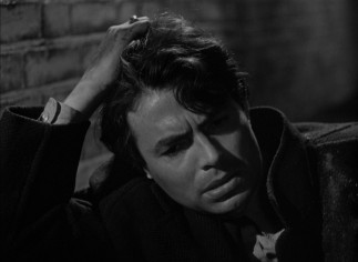 After falling out of a car, the wounded Johnny McQueen (James Mason) becomes the odd man out in an air raid shelter.