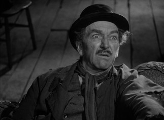 The penniless Shell (F.J. McCormick) plans to turn Johnny over to his friends for a reward.