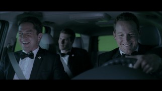 Gerard Butler and Cole Hauser share a laugh on a green screen drive in the Olympus Has Fallen gag reel.