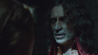 Rumplestiltskin (Robert Carlyle) exudes a shimmering glow as the Dark Lord of the fairy tale world.