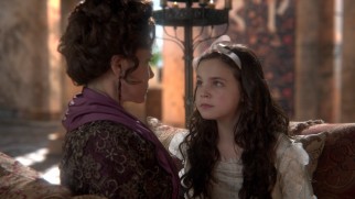 A young Snow White (Bailee Madison) lets out a damning secret to the Queen's vindictive mother (Barbara Hershey) in "The Stable Boy."