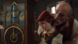 Geppetto (Tony Amendola) gets his wish as his wooden son Pinocchio (Jakob Davies) becomes a real boy.
