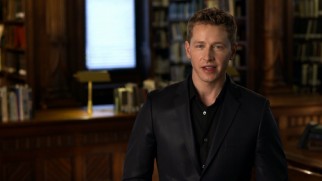 In a library (or a library set), Josh Dallas hosts "Once Upon a Time: Origins", a featurette detailing five fairy tales' histories.
