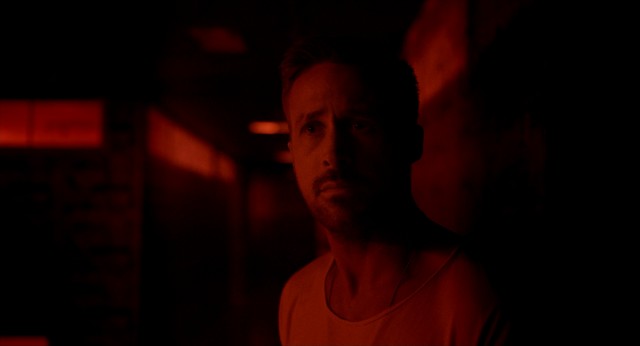 No primary color gets neglected in Nicolas Winding Refn's stylized visuals. Here, red gets its chance to tint a silent Ryan Gosling.