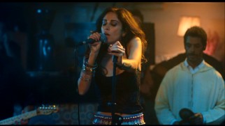 The music video for Yashmine Hamdan's "Hal" extends the song's random performance in the film.