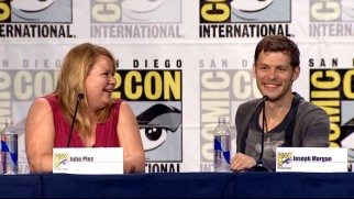 Creator and showrunner Julie Plec is seated next to her top-billed actor Joseph Morgan at The Originals' 2013 Comic-Con Panel.