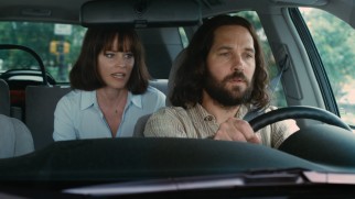 Ned (Paul Rudd) lends his driving services to Miranda (Elizabeth Banks) as she talks with an important lady.