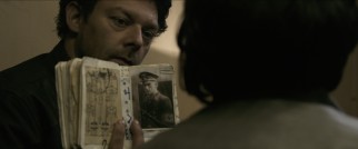 Wallace (Richard Coyle) reveals to Lena that reports of some Nazi camp commanders' deaths have been greatly exaggerated.