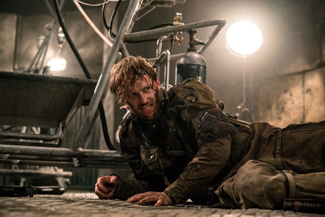 Wyatt Russell follows his father Kurt's footsteps into action hero mode as Corporal Ford.
