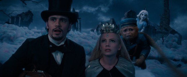 Oz (James Franco), Glinda (Michelle Williams), Finley, and the China Girl find themselves under attack in the clouded Dark Forest.
