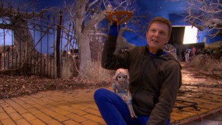 Covering up his bluescreen suit with a sweatshirt, Phillip Huber discusses his work as the China Girl's marionette artist.