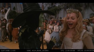 A wicked witch and a good witch share a laugh in the bloopers reel.