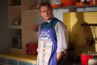 Mr. Brown (Hugh Bonneville) isn't crazy about the notion of putting up a bear in his house.
