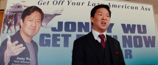 Self-made multi-millionaire Jonny Wu (Ken Jeong) encourages those attending his seminar (including Daniel) to be "doers."