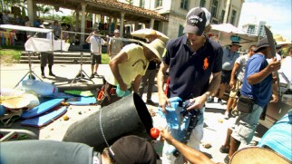 With a lollipop in his mouth, Michael Bay determines which debris should feature in a shot.