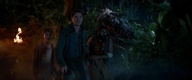 A Never Bird sneaks up on Peter (Levi Miller), Hook (Garrett Hedlund), and Smee (Adeel Akhtar).