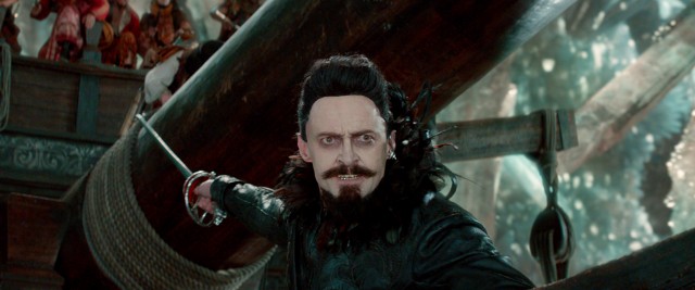 Hugh Jackman undergoes a dramatic makeover to play Blackbeard, a feared pirate kept young by Pixum.