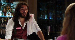 "Sweet" William Carr (Russell Brand) serves Lamb her first alcoholic drink and reconnects with her later in the night.