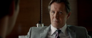 As English CEO Nicolas Wyatt, Gary Oldman doesn't need the Russian accent with which he last squared off with Harrison Ford.