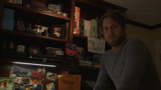 Video game maker Ryan Fleege (Chris J. Murray) discovers a stash of home movies from 1988 through 1992 in "Paranormal Activity: The Ghost Dimension."