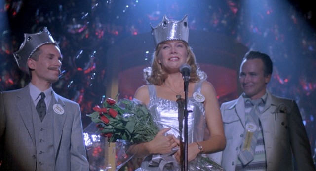 Peggy Sue Bodell (Kathleen Turner) is named queen at her 25-year high school reunion, an honor that shortly precedes an inexplicable journey back in time for her in "Peggy Sue Got Married."